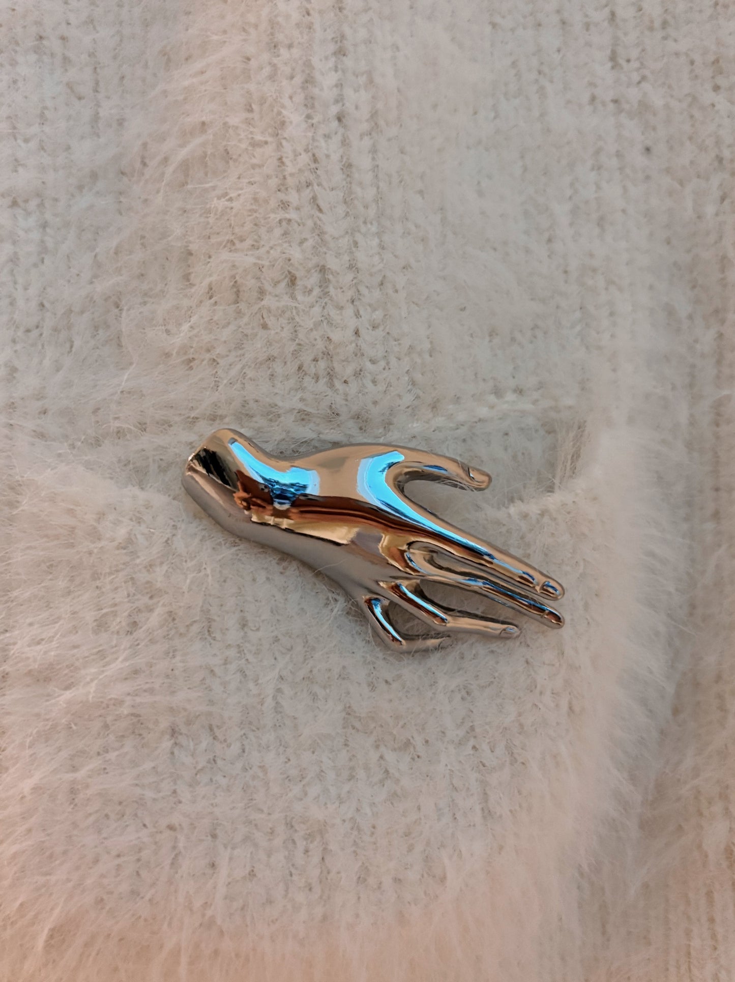 Broche Main prateado